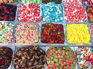 assorted candies in plastic containers